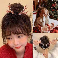 LRKNNO Christmas reindeer clip with rhinestones adds festive sparkle.