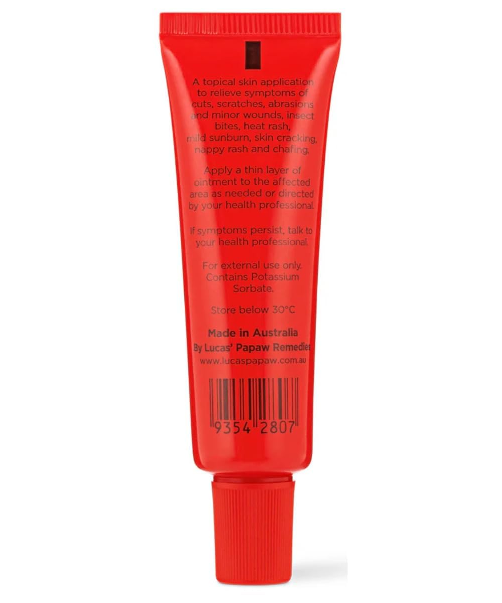 Lucas Papaw Ointment 15g tube applying on dry skin for gentle moisturization.