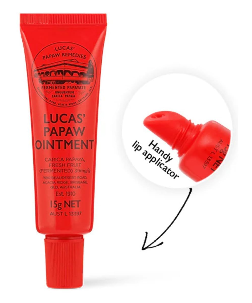 Lucas Papaw Ointment 15g tube on hand during balm application.