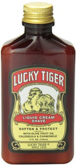 Lucky Tiger Liquid Cream Shave olive-oil ingredient shot suggests nourished skin and hydration after shaving