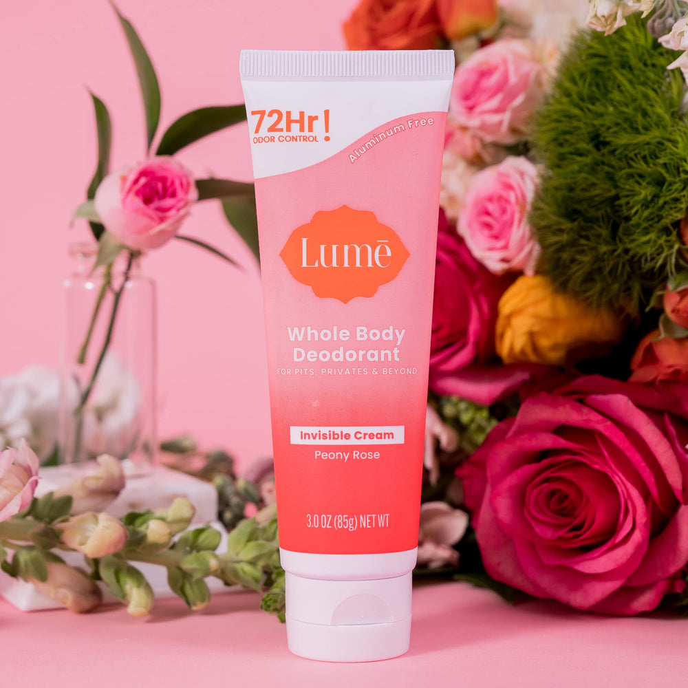 Lume Peony Rose on-the-go application demonstrating portable odor control.