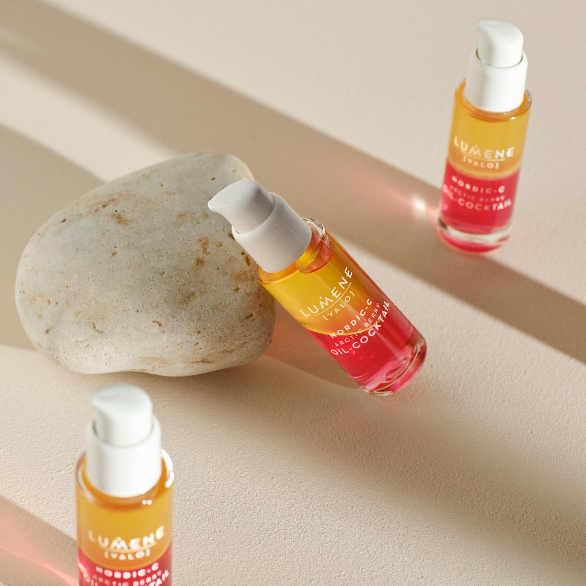 Lumene Nordic-C Valo Arctic Berry Face Oil being applied to face and neck after cleansing