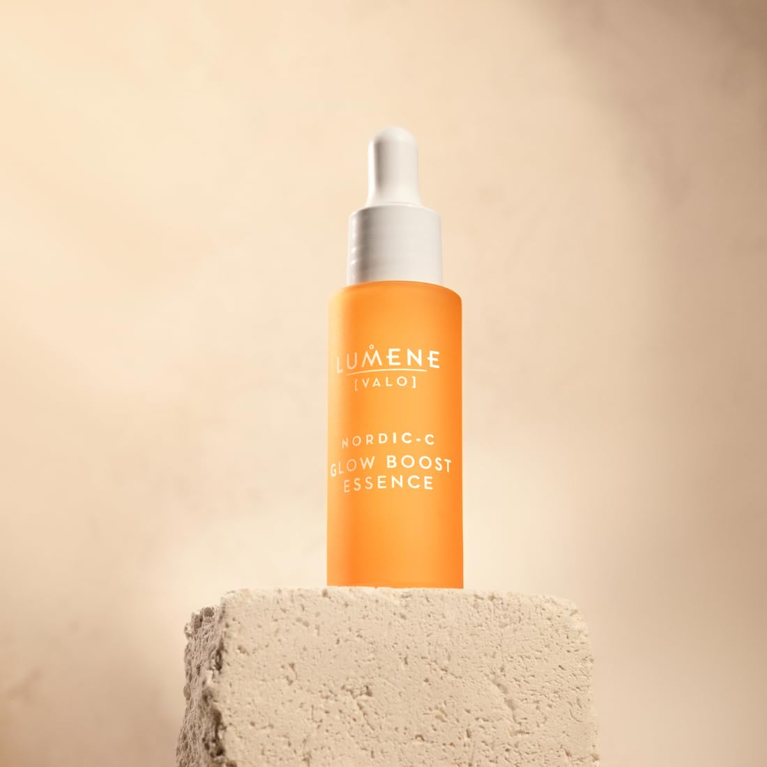 Lumene Nordic-C Valo Glow Boost serum shows hyaluronic acid droplets for moisture delivery