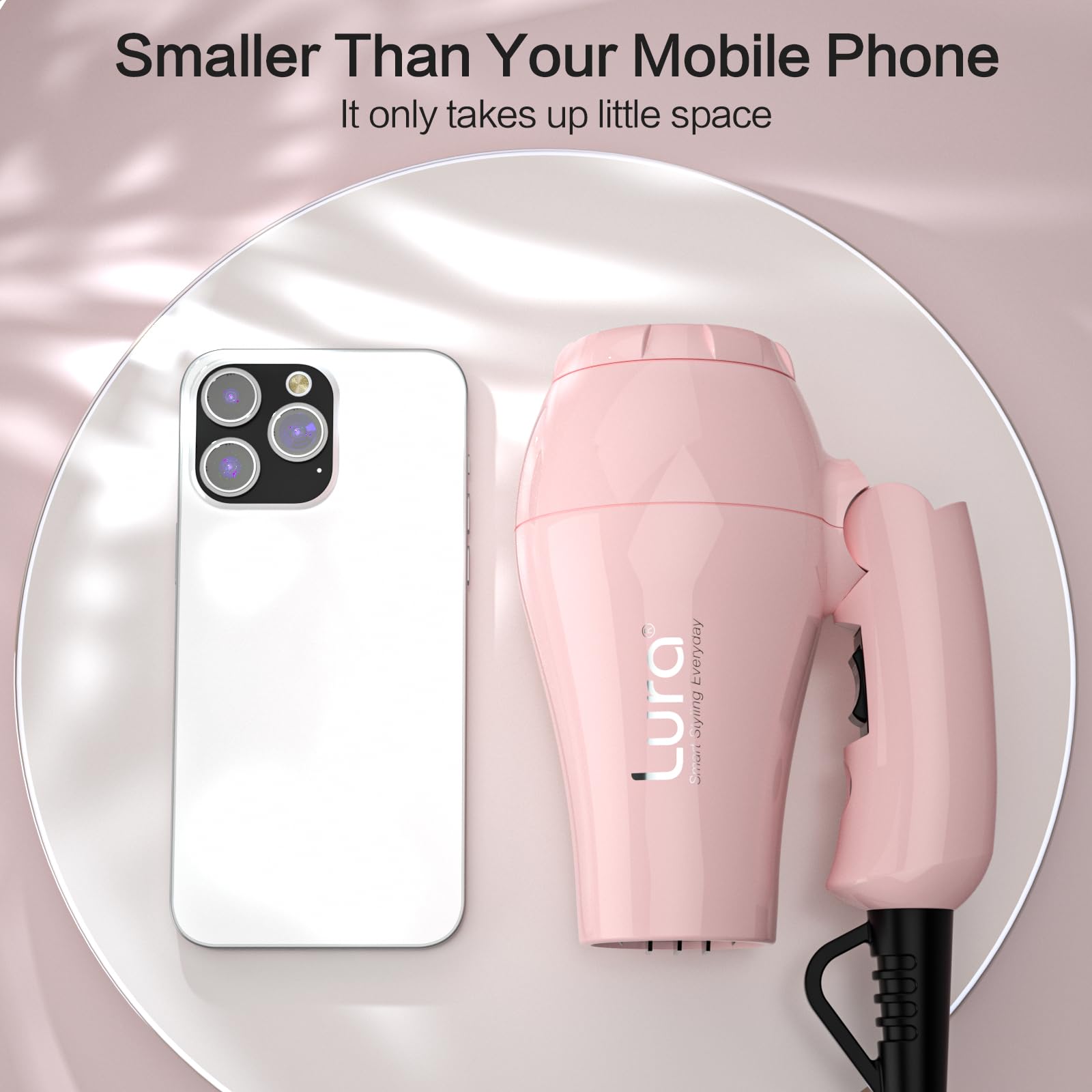 LURA dual-voltage travel hair dryer shows switch detail for use abroad.