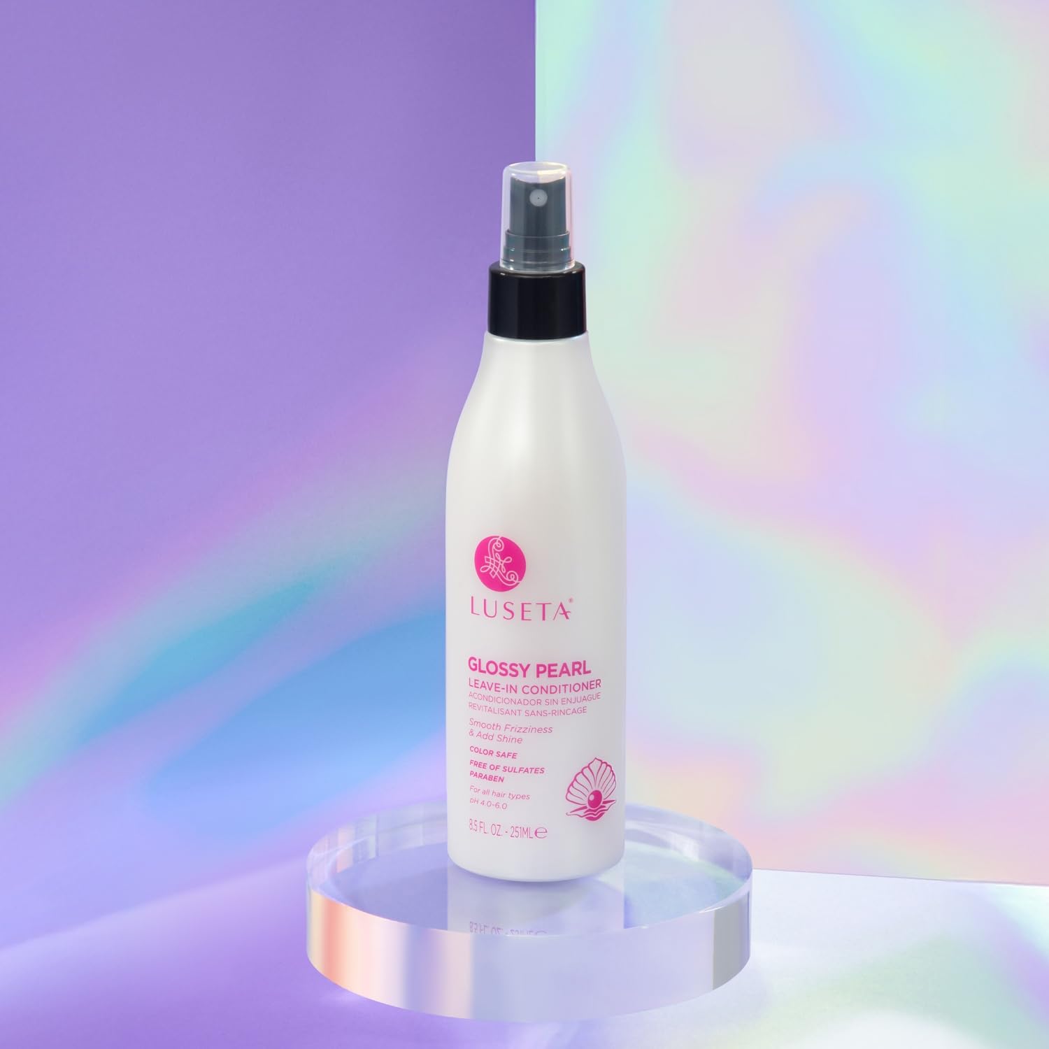 Luseta Glossy Pearl Leave-In Conditioner on silky hair for smoother styling.