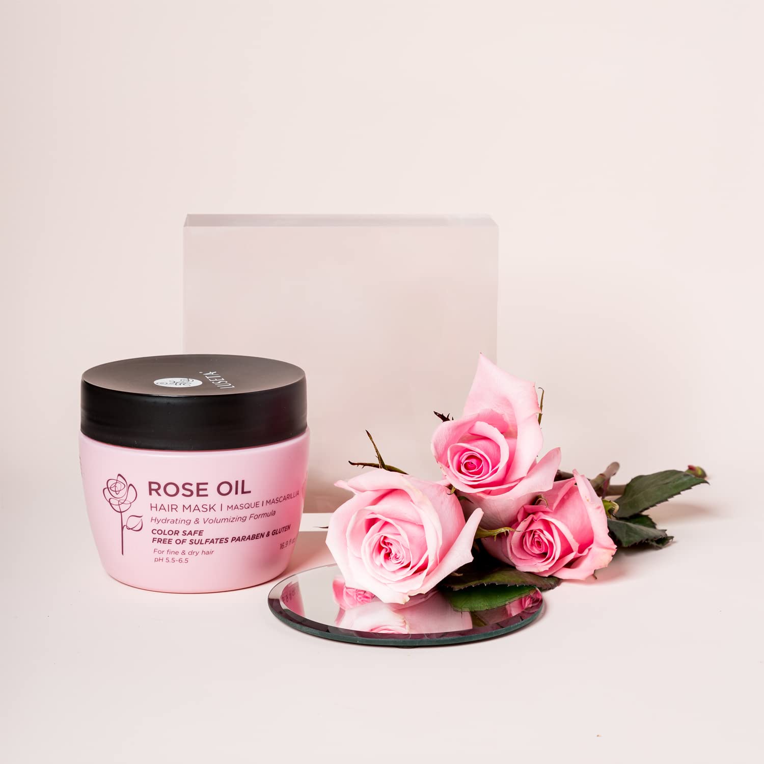 Luseta rose oil hair mask rose oil closeup emphasizing conditioning power