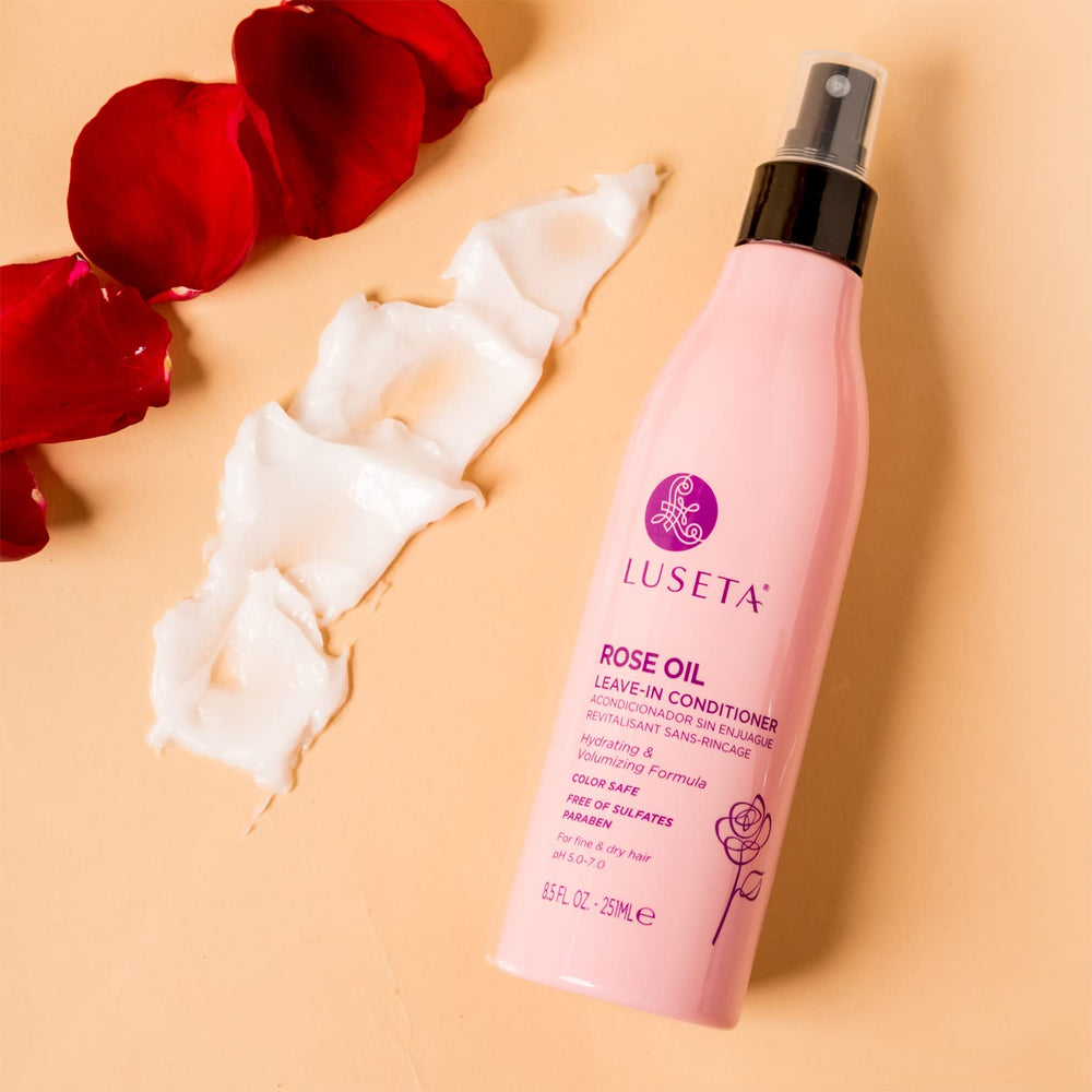 Luseta rose oil leave-in conditioner on hair after styling for detangled shine