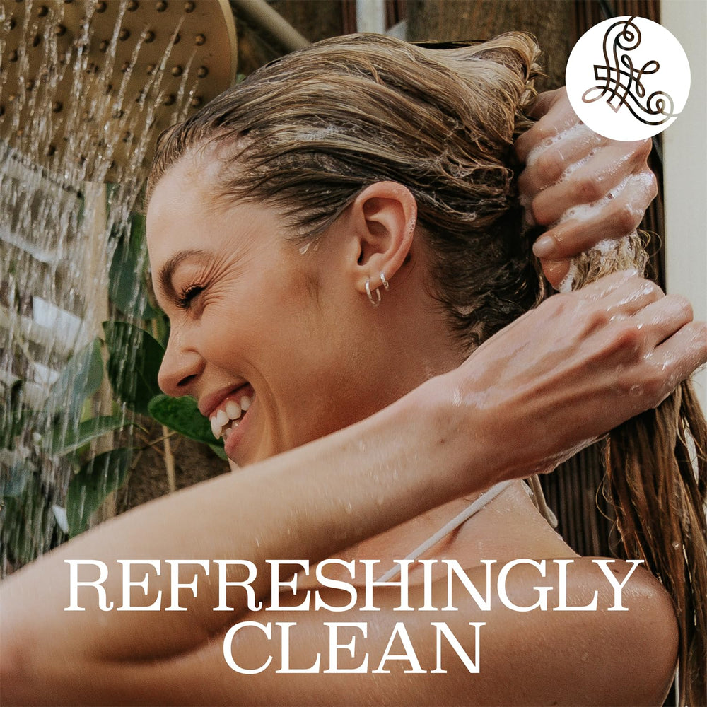 Luseta Tea Tree Shampoo application scene shows gentle scalp massage ritual