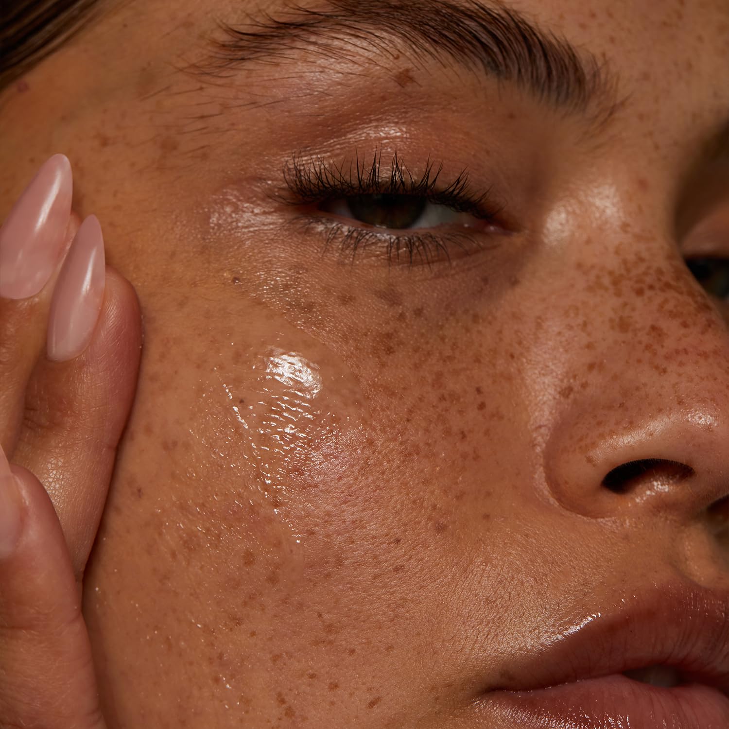 Lux Unfiltered Face Cleansing Balm texture shown with a rich, silky scoop