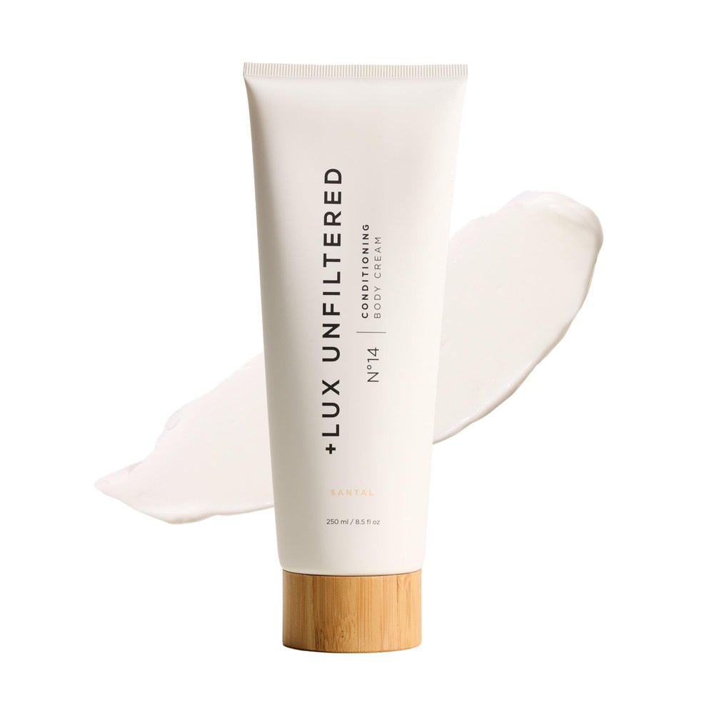 Lux Unfiltered N°14 conditioning body cream bottle closeup, highlighting hydration.