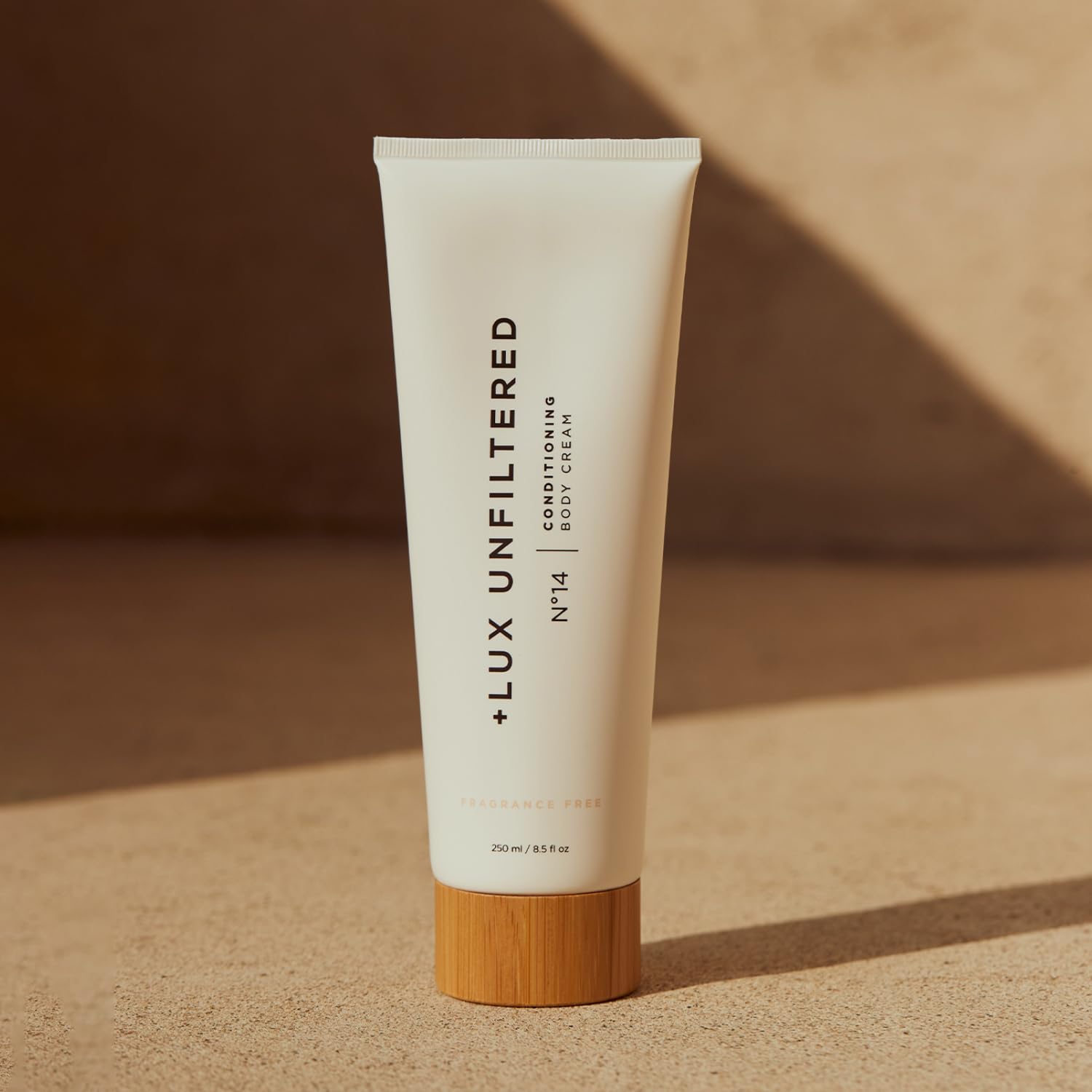 Lux Unfiltered N°14 application scene illustrating tanning prep before self-tan.