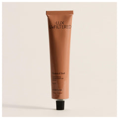 Lux Unfiltered N°24 hand cream jar close-up showing rich hydration for dry hands.