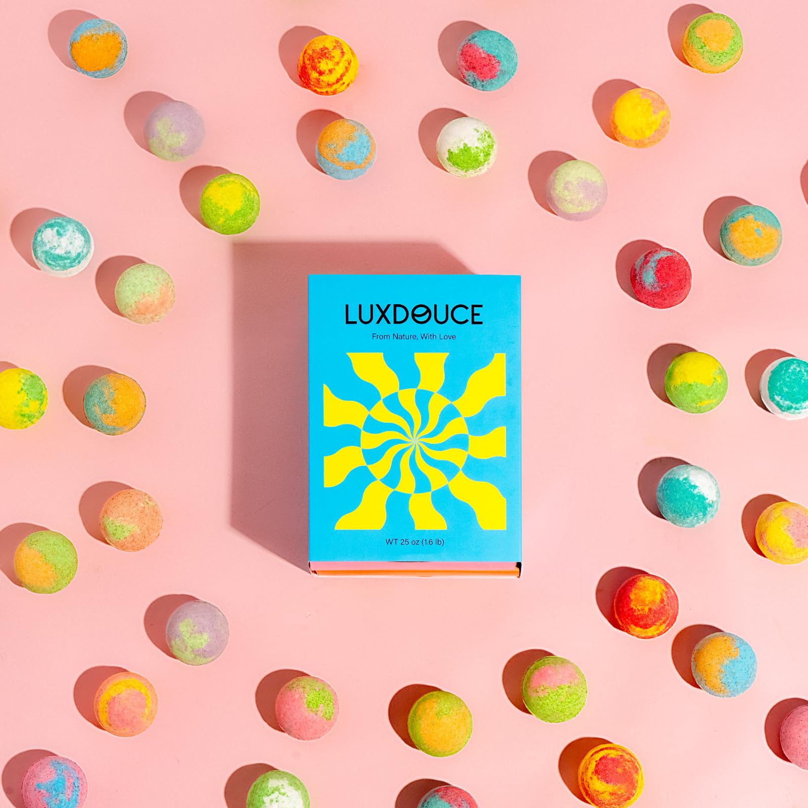 LUXDOUCE natural ingredients close-up with sodium bicarbonate and colorants for skin-friendly fizz.