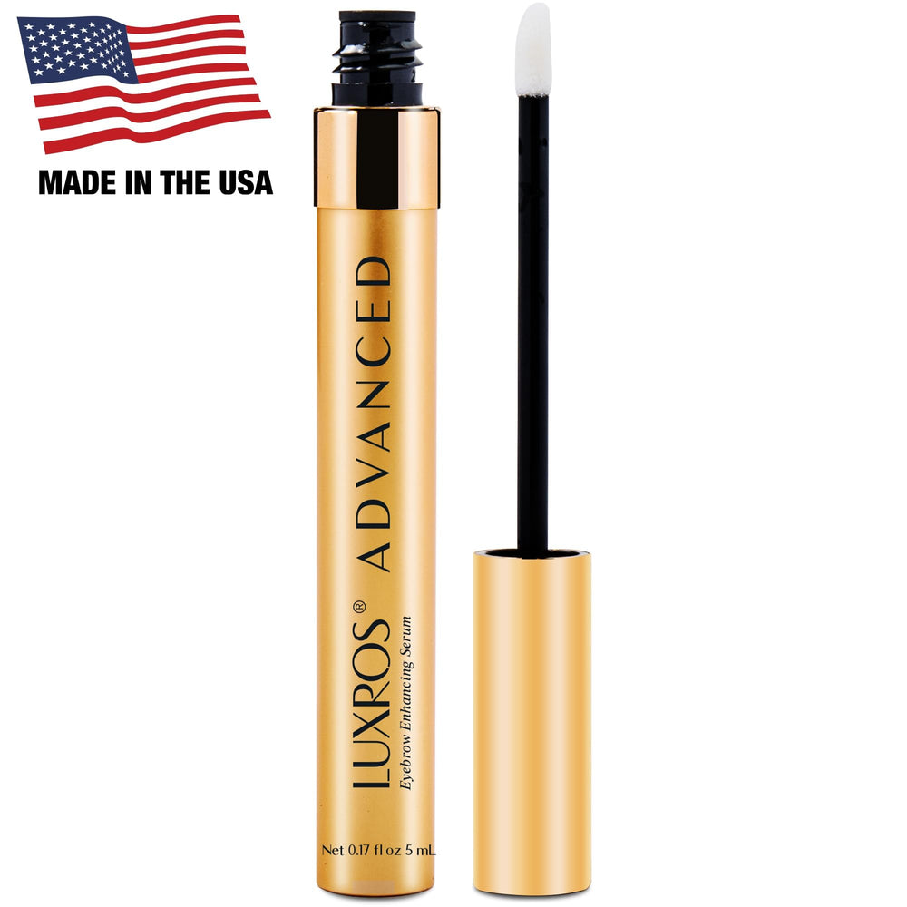 LUXROS eyebrow serum applicator brush ready for nightly application to support growth.