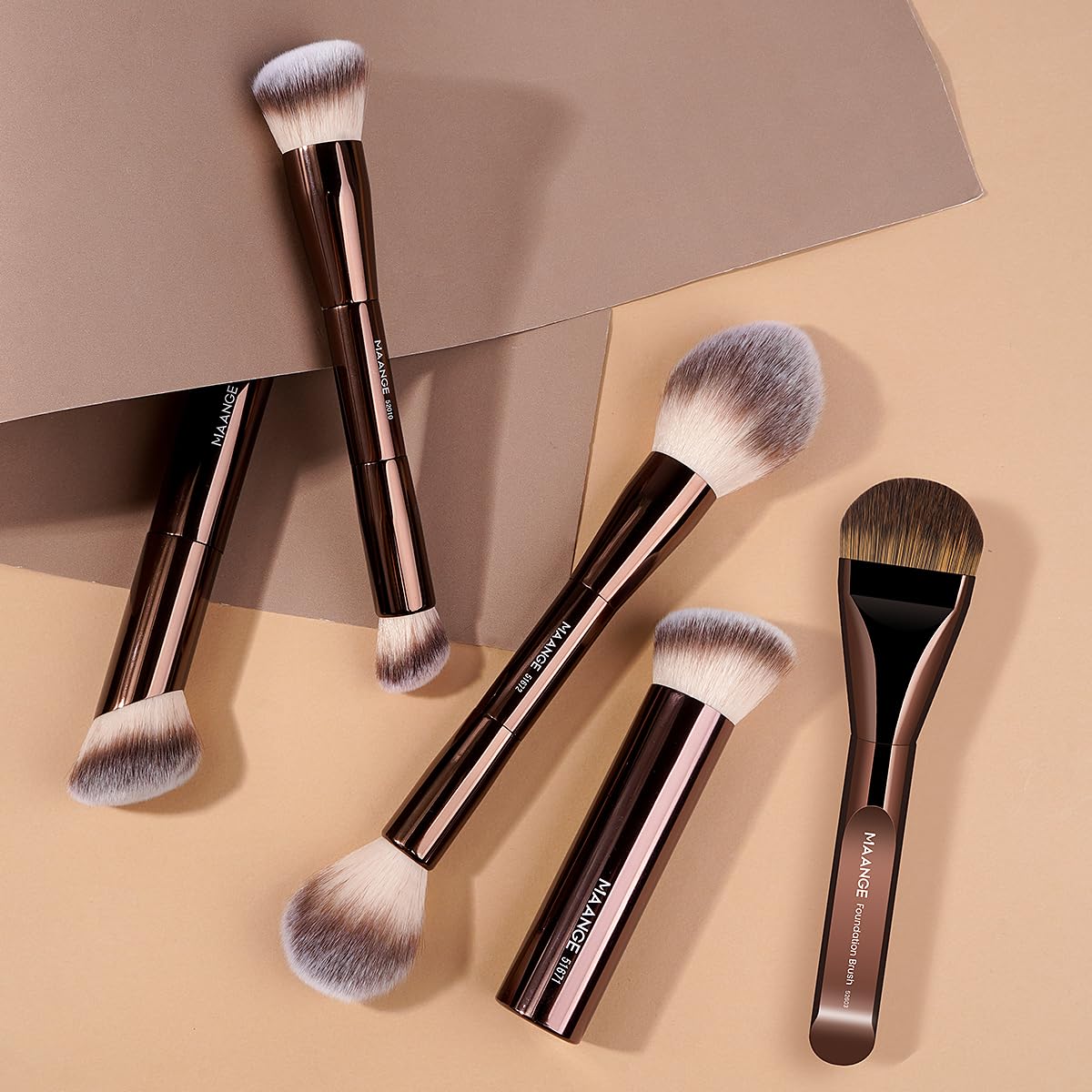 MAANGE ergonomic-angle brush follows facial curves for easy blending.
