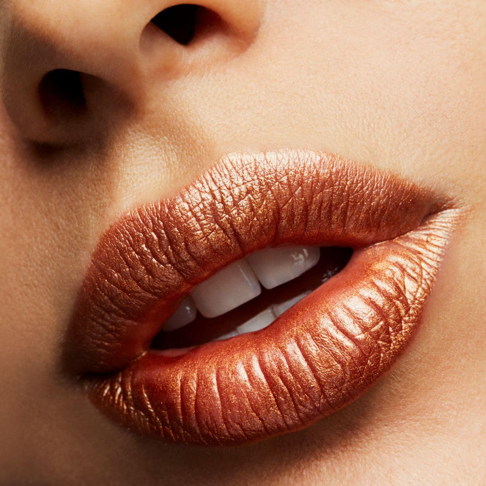 MAC Frost Lipstick Bronze Shimmer packaging box highlights long-lasting shine and luxury feel.
