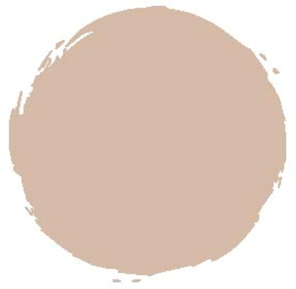 MAC Mineralize SkinFinish Natural Medium brush swatch shows buildable dimension on cheeks.
