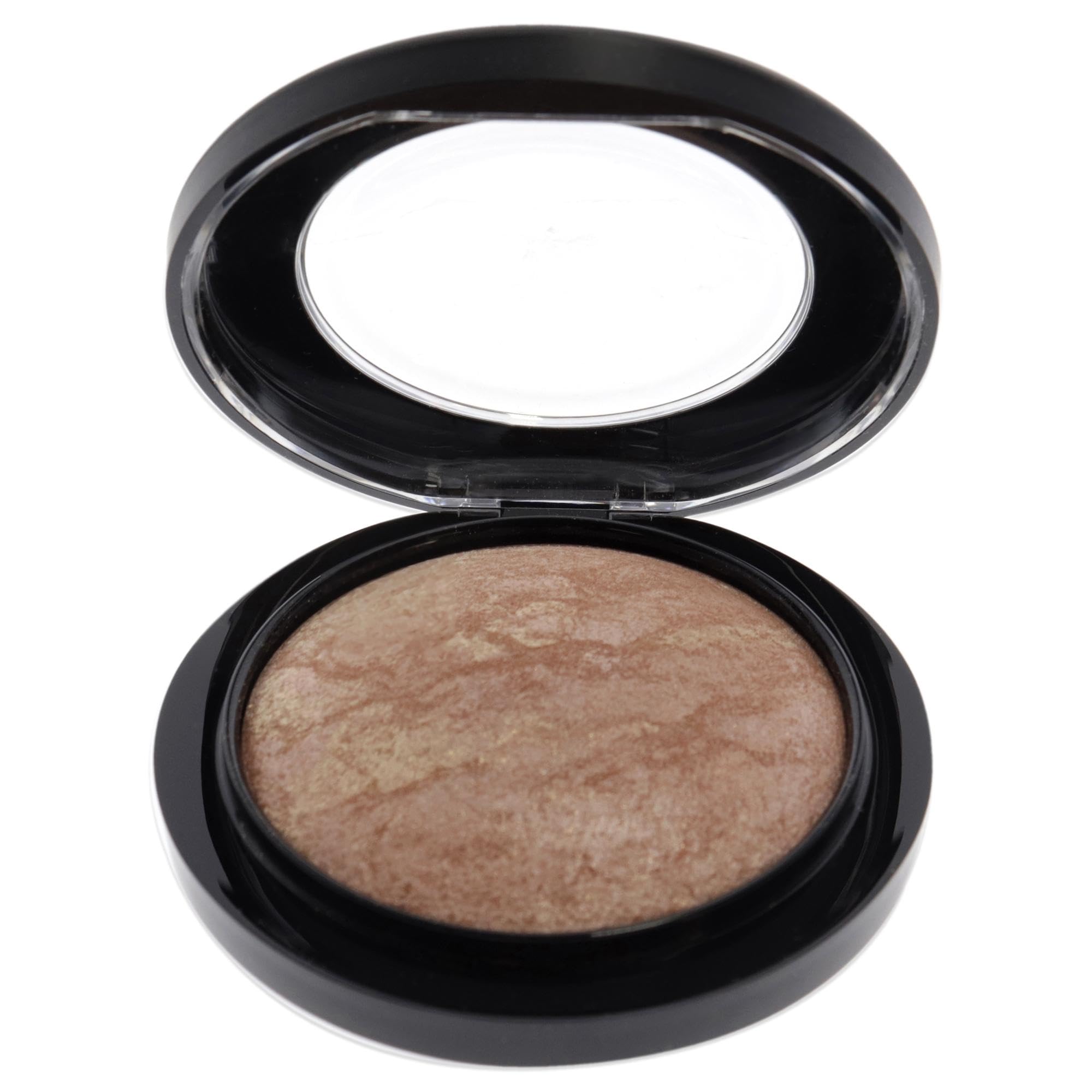 MAC Mineralize Skinfinish Soft Gentle highlights cheekbones with luminous radiance.