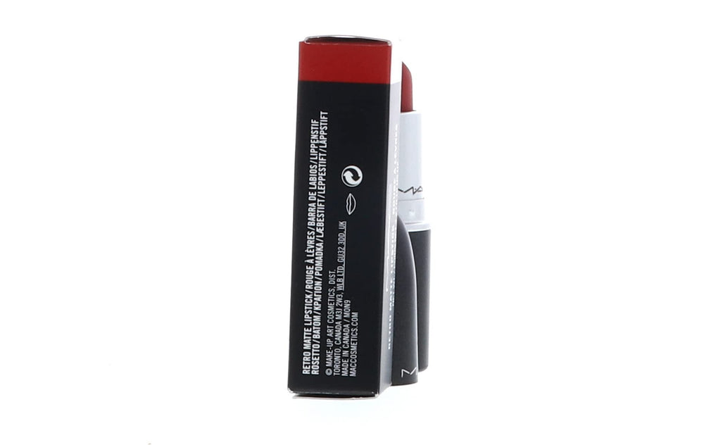 MAC Ruby Woo worn on lips for bold evening look.