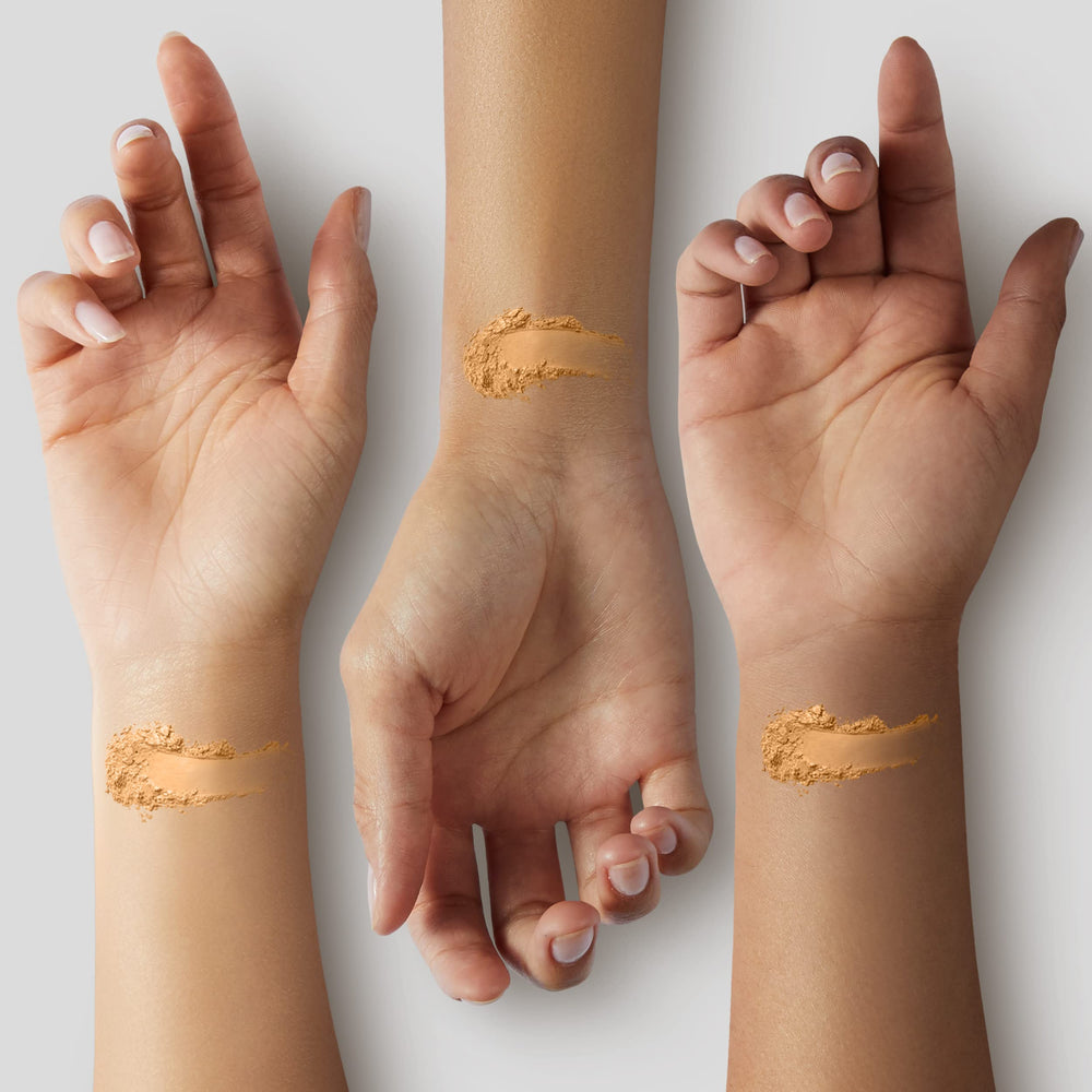 MAC Studio Fix Powder Plus Foundation NW43 on portrait skin highlights refined pores with a natural matte look.