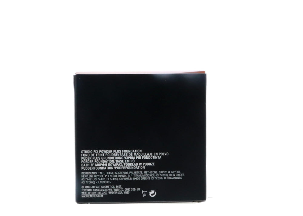 MAC Studio Fix Powder Plus Foundation NW43 packaging sits beside makeup bag for on-the-go touch-ups.
