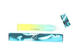 MAC Turquatic rollerball closeup label highlights sleek bottle design and brand heritage.