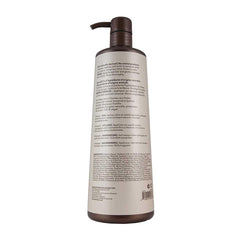 Macadamia Professional Nourishing Repair Shampoo pours to reveal hydrating formula for color-treated hair.