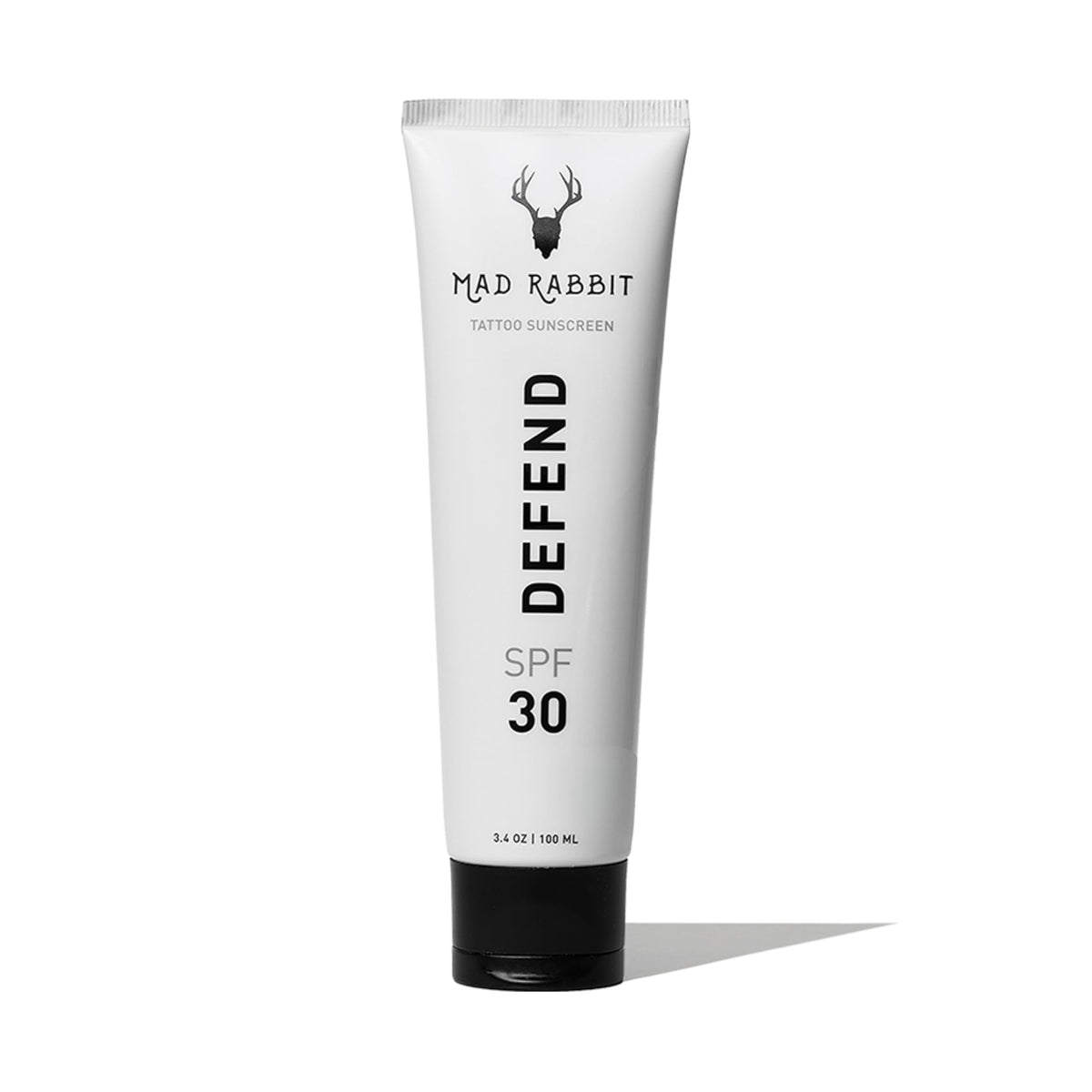 Mad Rabbit Defend Tattoo Sunscreen bottle front showing mineral protection for skin and ink