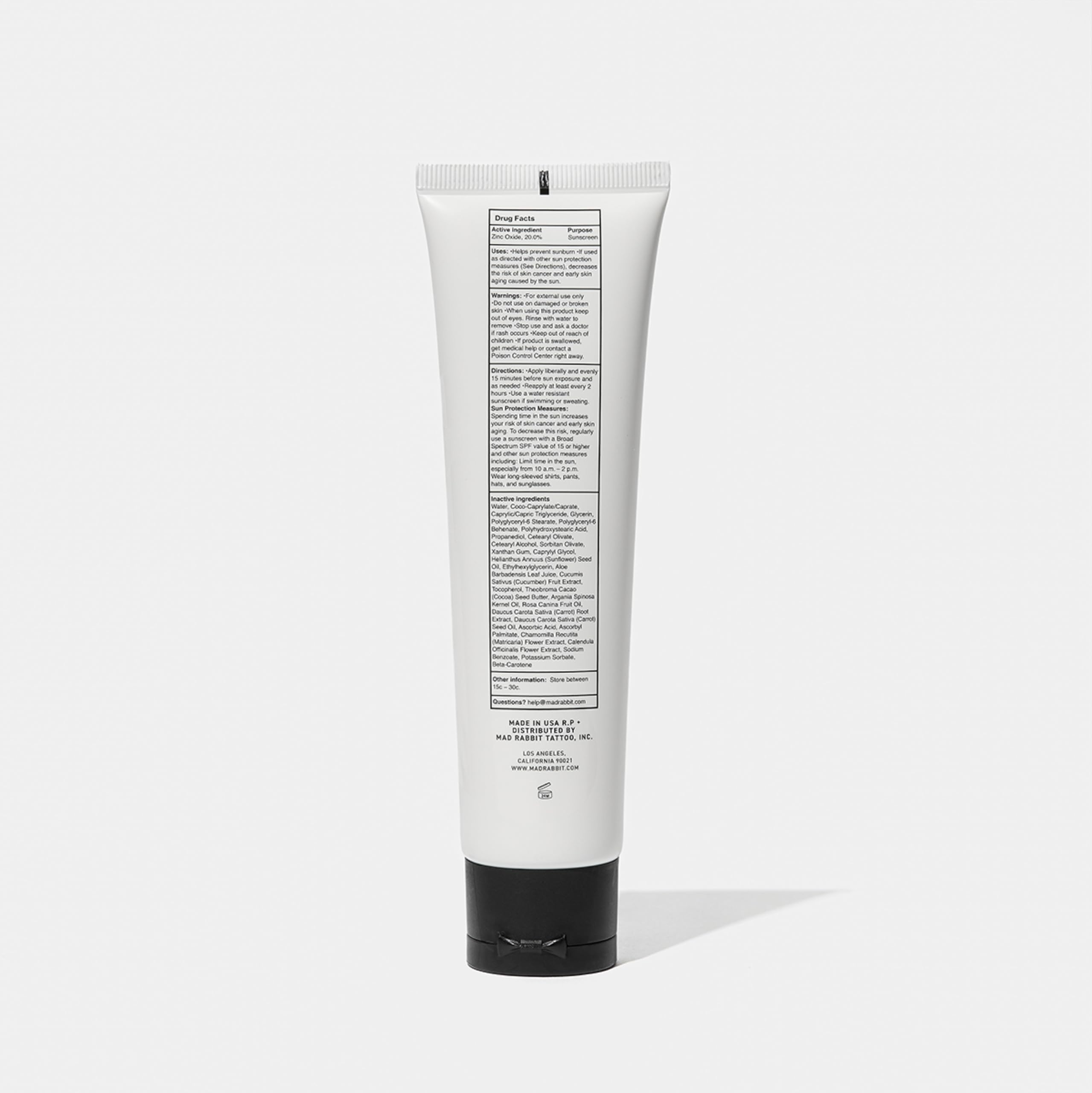 Mad Rabbit Defend Tattoo Sunscreen packaging box emphasizes travel-friendly 100 mL size