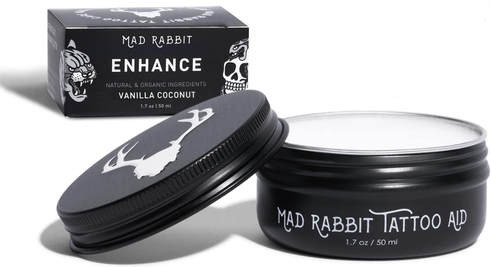 Mad Rabbit Enhance Balm being applied for deeper color and refreshed ink contrast