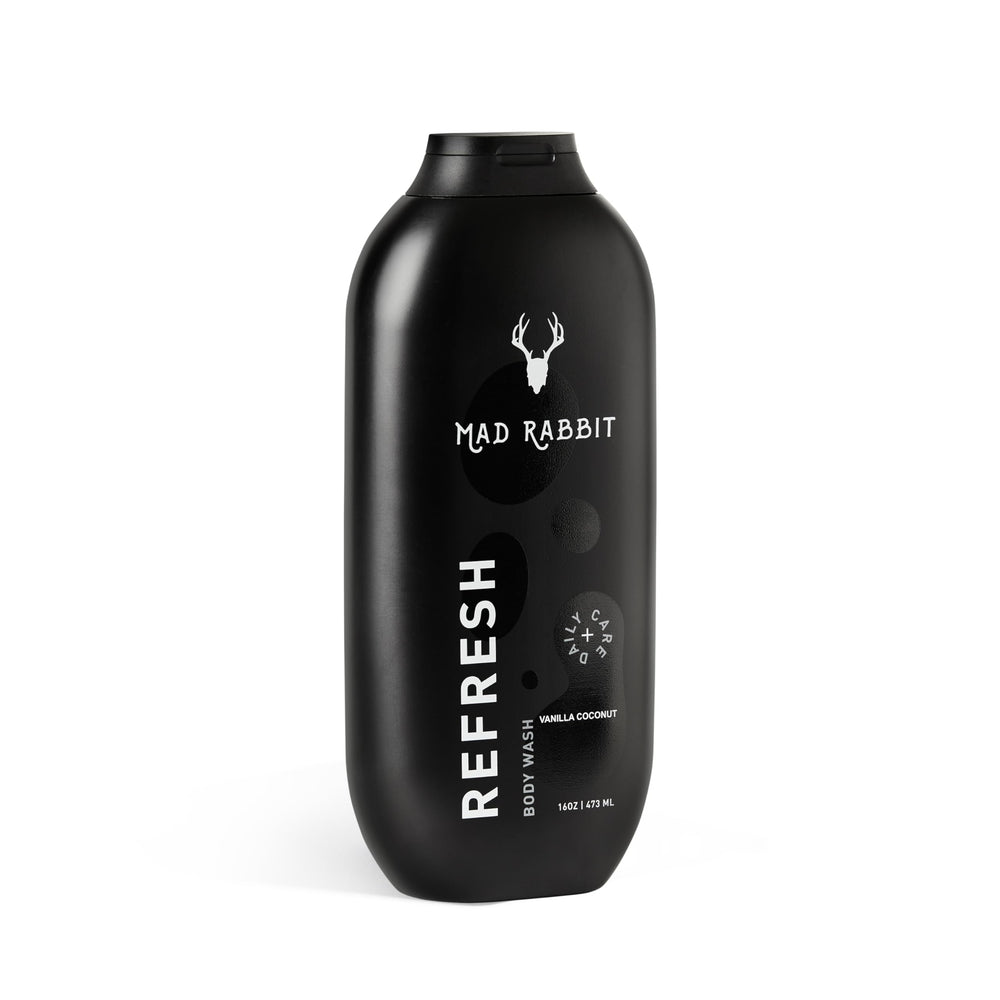 Mad Rabbit Refresh Body Wash bottle closeup highlighting hydrating formula for all skin types.