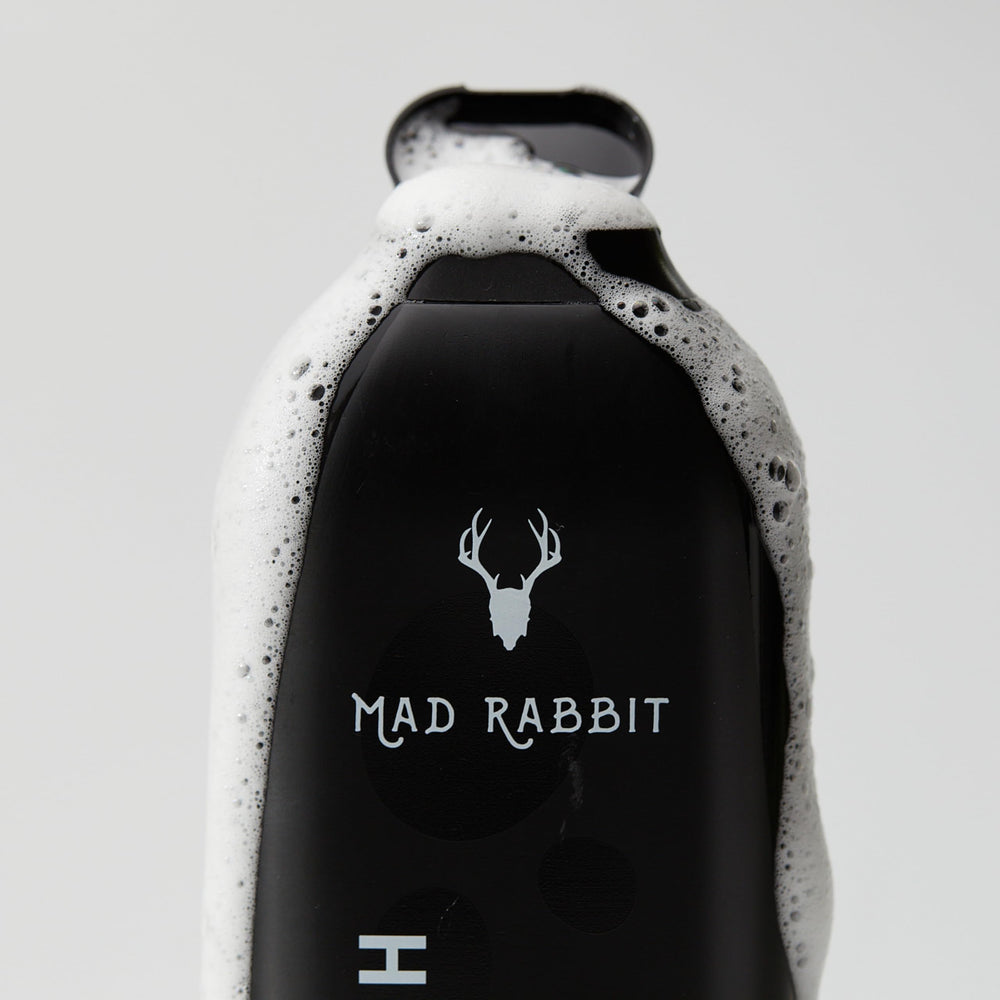 Mad Rabbit Refresh Body Wash tattoo care scene conveys suitability for existing tattoos.