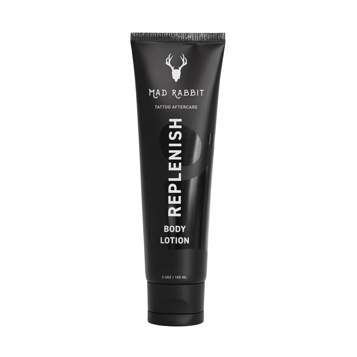Mad Rabbit Replenish tattoo body lotion bottle shows lightweight daily hydration.