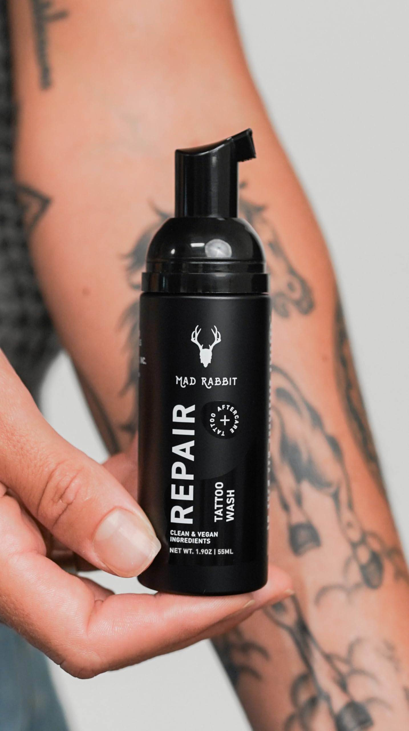 Mad Rabbit Tattoo Aftercare Soap label detail emphasizes vegan ingredients for everyday care.