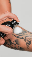 Mad Rabbit Tattoo Aftercare Soap packaging side showcases unscented formula for sensitive ink.
