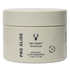 Mad Rabbit Tattoo Artist Glide bottle on a clean studio station for smooth tattooing and skin protection.