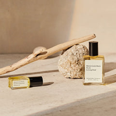 Maison Louis Marie No02 Le Long Fond roll-on application on wrist demonstrates easy, on-the-go scent application.