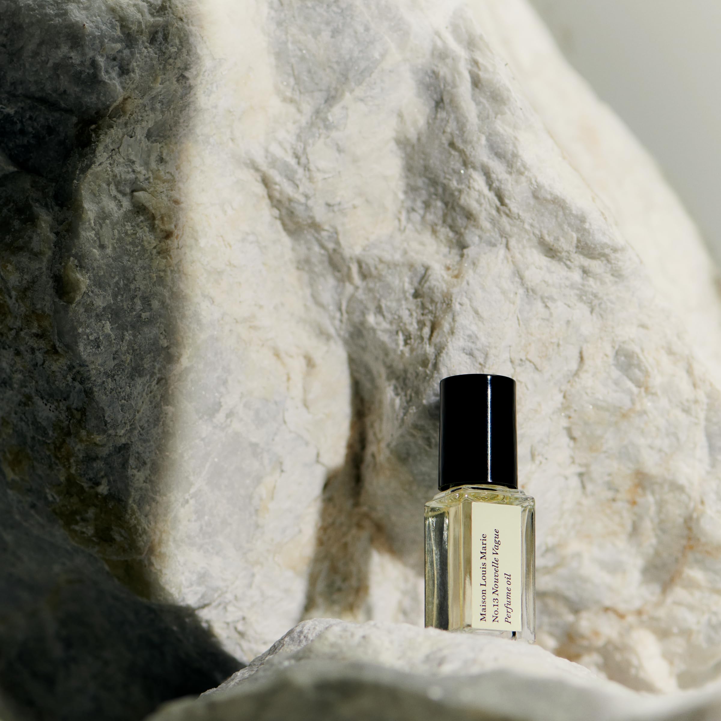 Maison Louis Marie No.13 application to pulse points demonstrates intimate scent release.