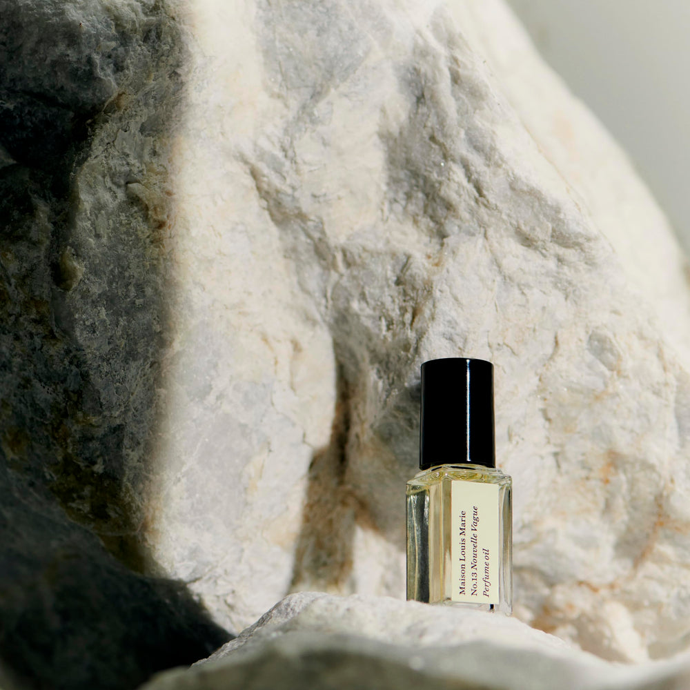 Maison Louis Marie No.13 application to pulse points demonstrates intimate scent release.