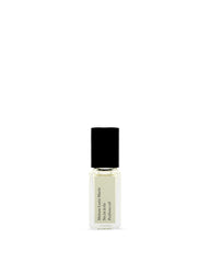 Maison Louis Marie No.14 Icila roll-on bottle showing citrus-floral scent profile for on-the-go use.