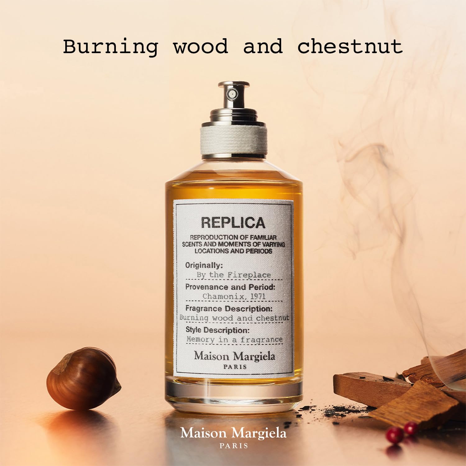 Vanilla hints swirl around Maison Margiela Replica By the Fireplace bottle for comforting warmth.