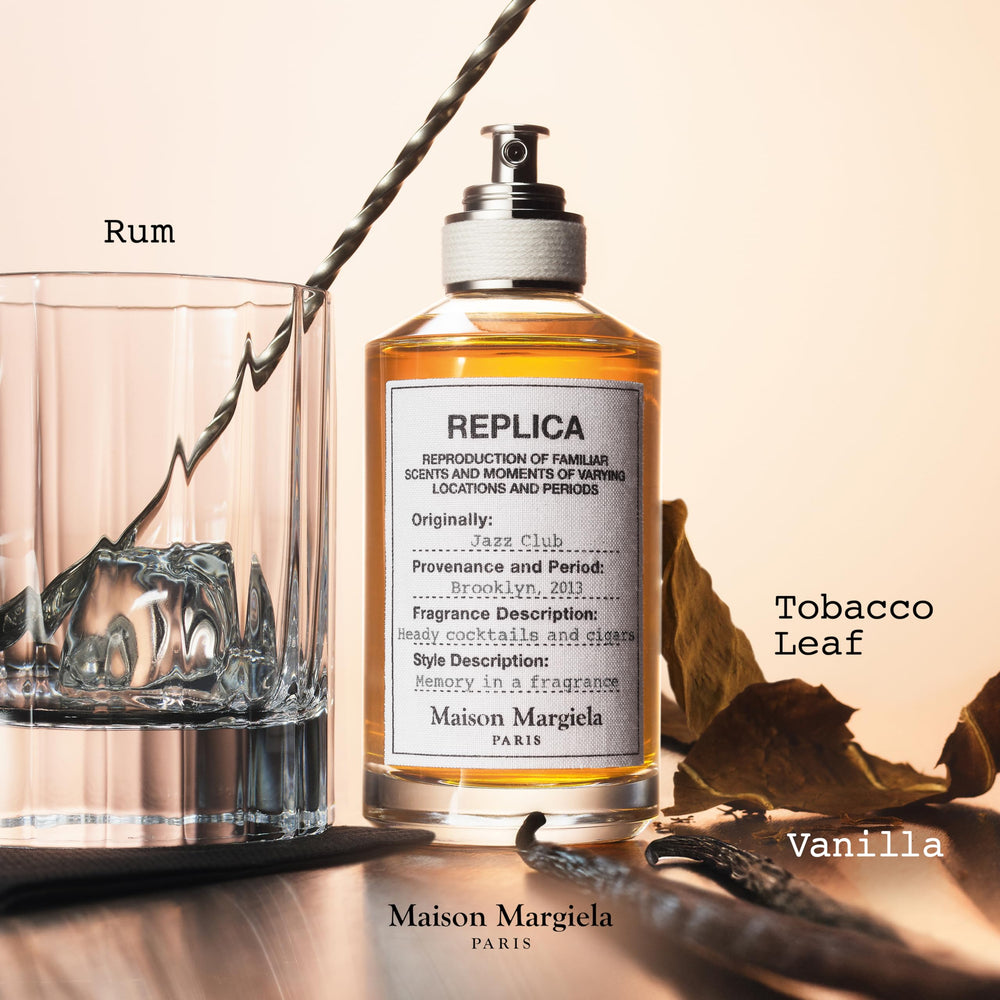 Maison Margiela Jazz Club atmosphere scene with a glass, highlighting rum notes for evening wear