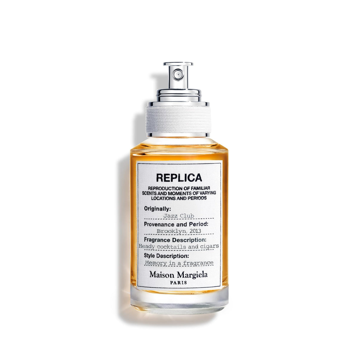 Maison Margiela Jazz Club bottle closeup showing vanilla and tobacco warmth for date nights
