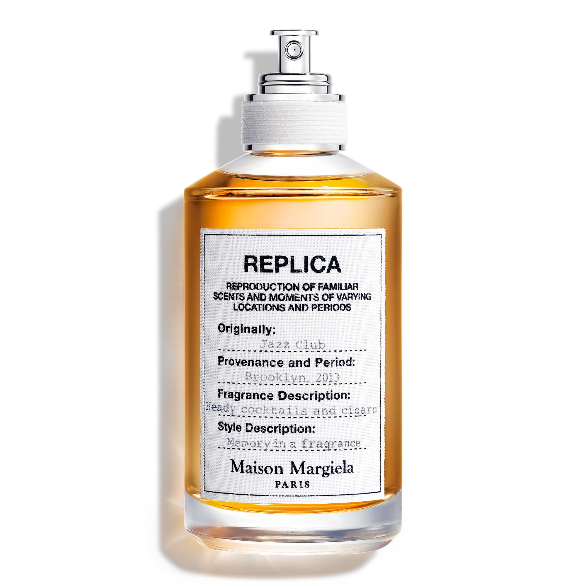 Maison Margiela Replica Jazz Club bottle on display for evening wear and warm ambience.