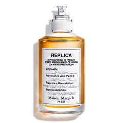 Maison Margiela Replica Jazz Club bottle on display for evening wear and warm ambience.