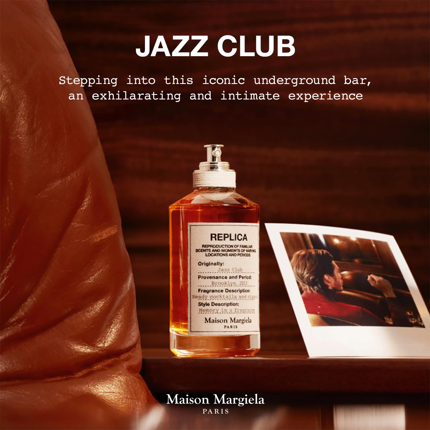 Maison Margiela Replica Jazz Club wood-surface image evokes warm cocktail-bar mood.