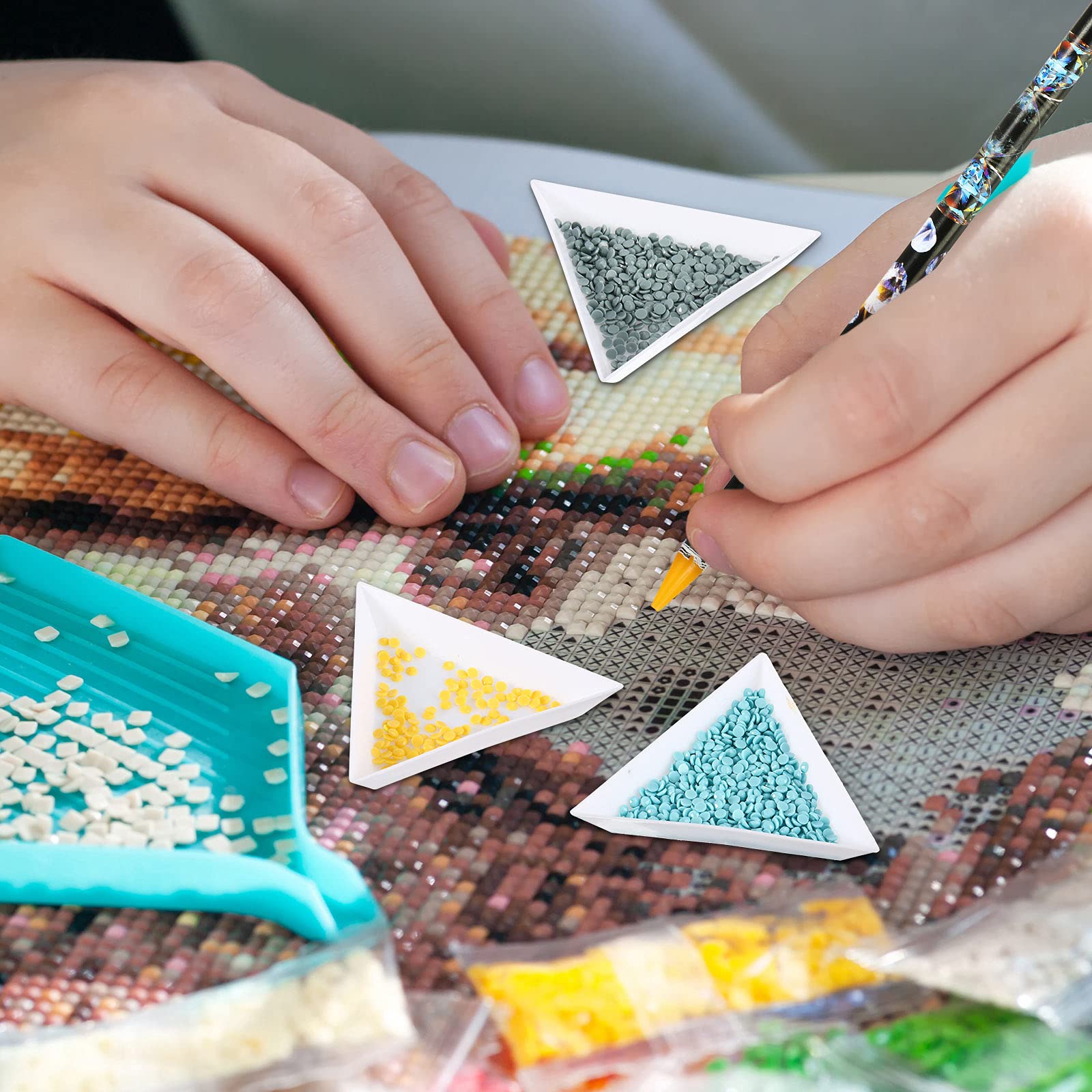Maitys nail art wax pen in action during manicure for precise placement.