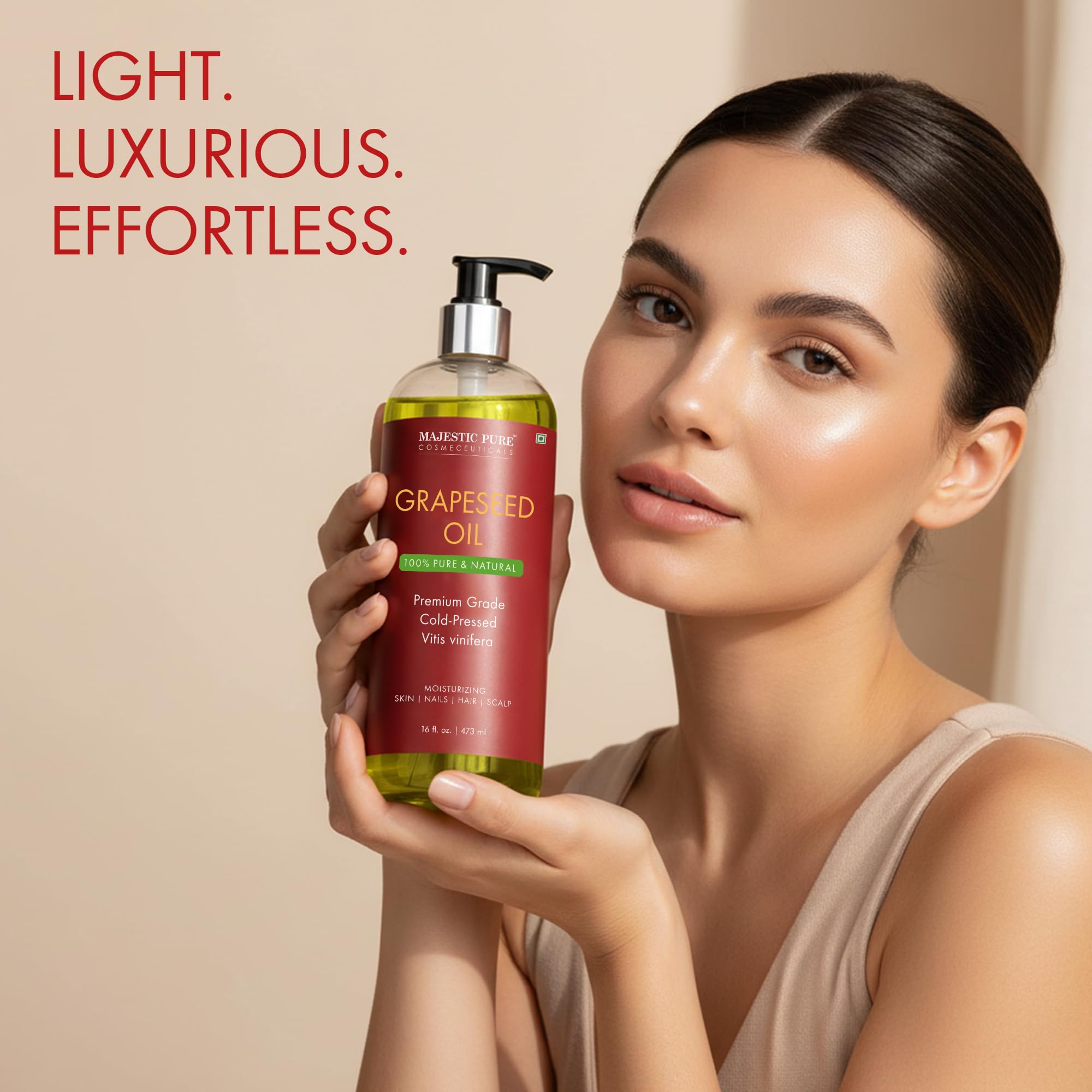Majestic Pure grapeseed oil label highlights cold-pressed purity.
