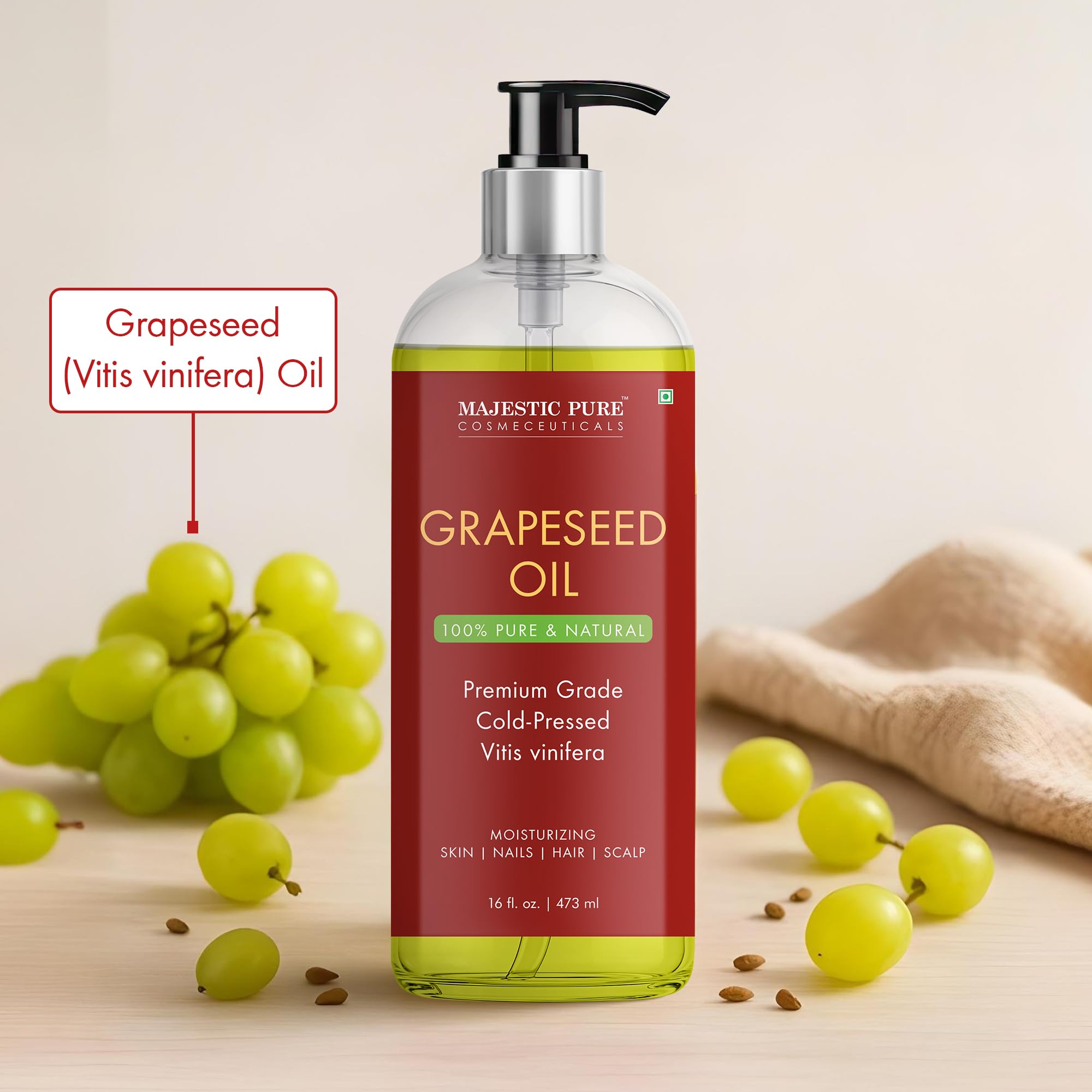 Majestic Pure grapeseed oil on hair-care setup for nourishing strands.