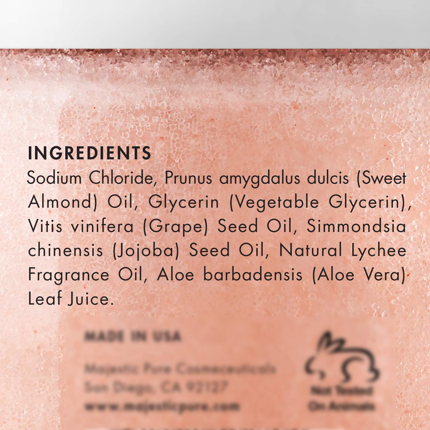Majestic Pure Himalayan Pink Salt texture showing pink crystals for pore-minimizing exfoliation.